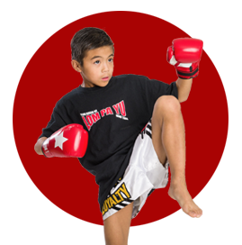 Kid practicing Muay Thai