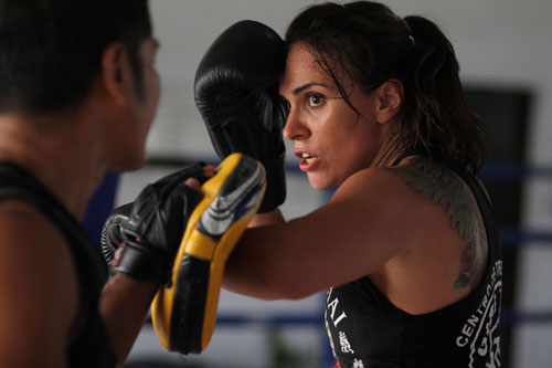 Woman training in Muay Thai in a Gym
